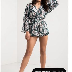Floral romper brand new